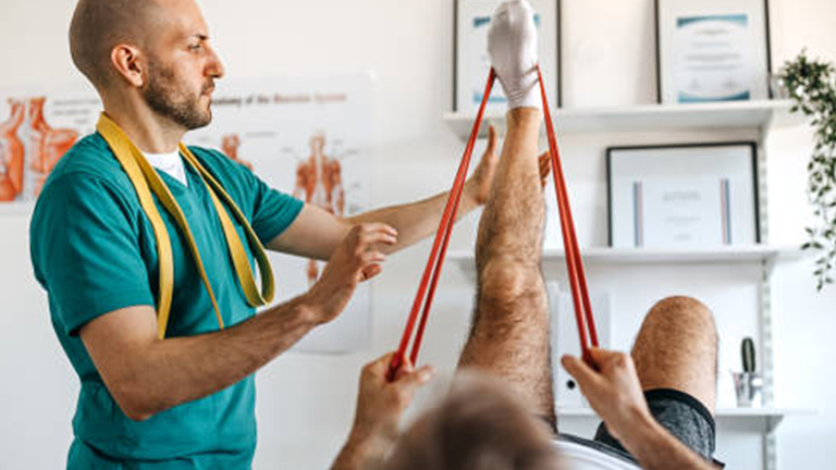 Physiotherapist working with patient